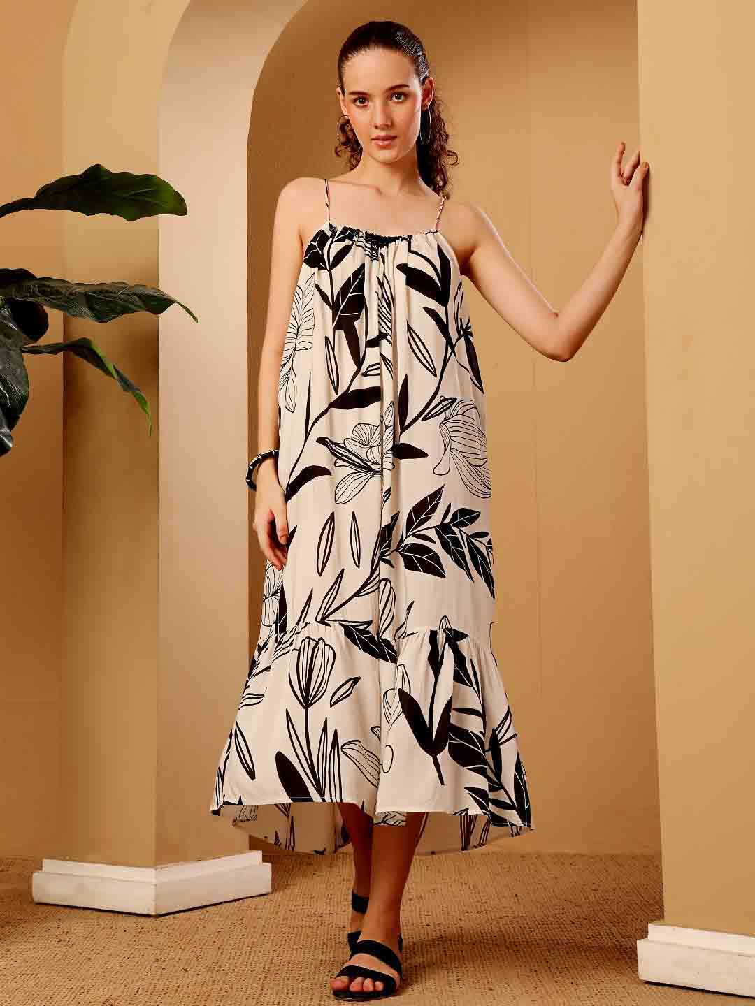 Front view of tropical printed resort maxi dress displaying the silhouette and print clearly
