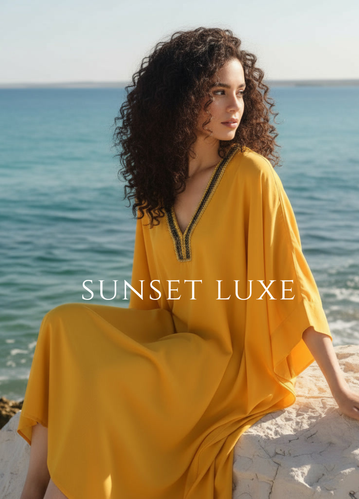 Woman in a yellow dress sitting on a beach with 'Sunset Luxe' branding.