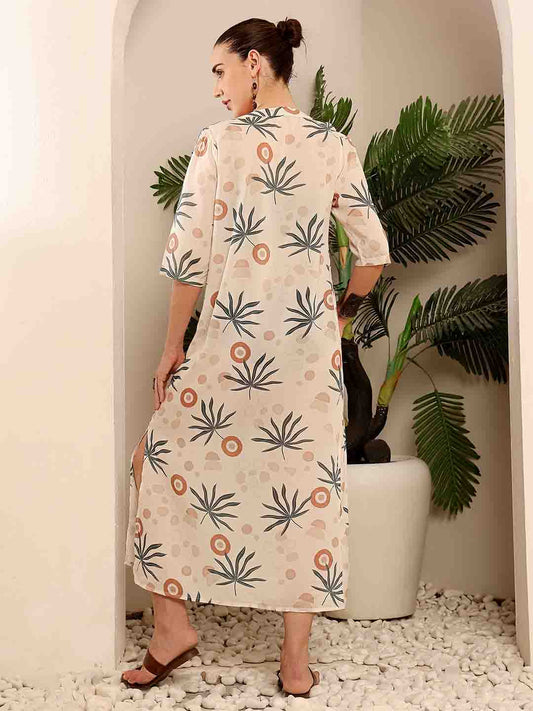 Back view of Beige printed Long beach coverup highlighting side slit and design elements