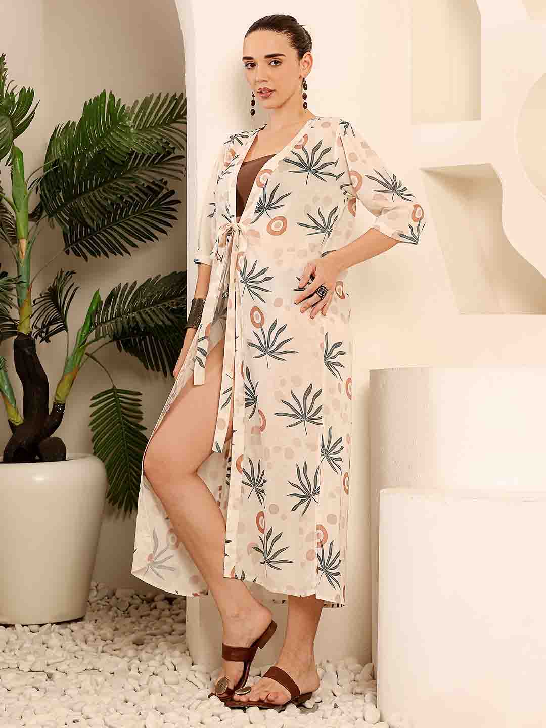 Side view of Beige printed Long beach coverup emphasizing relaxed fit and beach-ready style