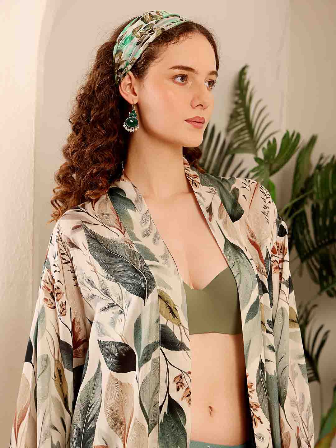 Side close-up of Beige Floral beach coverup showcasing fabric texture and floral pattern