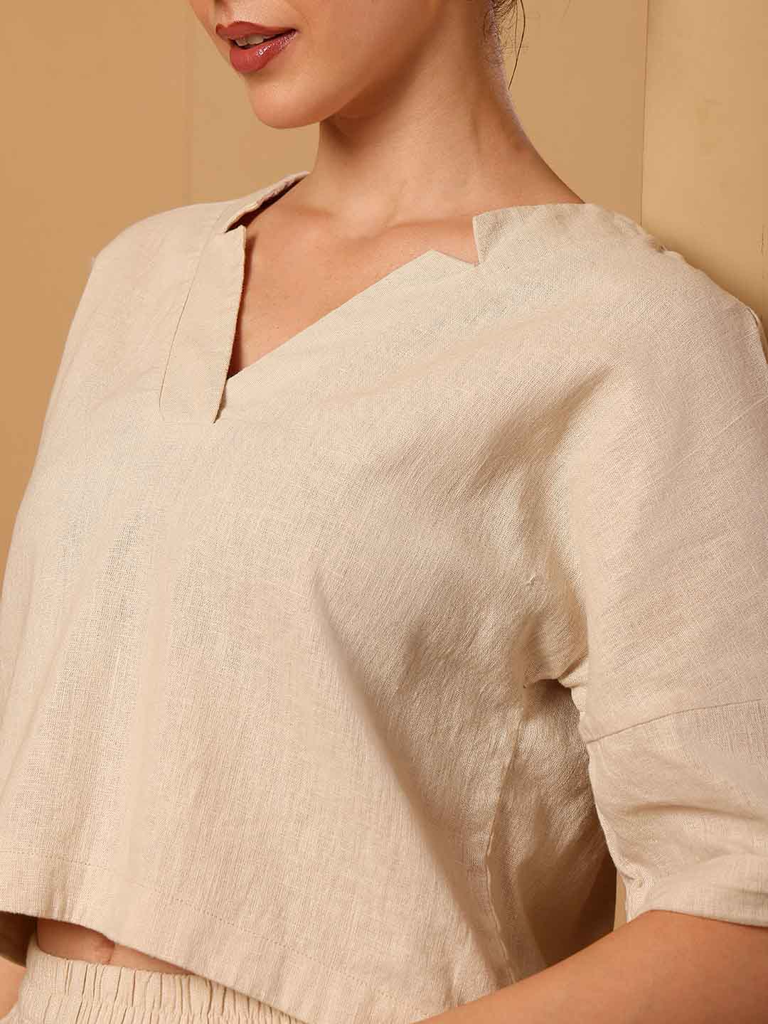 Close-up of Beige resort co-ord set highlighting neckline and fabric quality