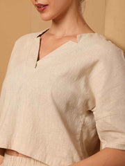 Close-up of Beige resort co-ord set highlighting neckline and fabric quality