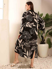 Back view of Black Floral beach coverup highlighting the flowy silhouette and print detail