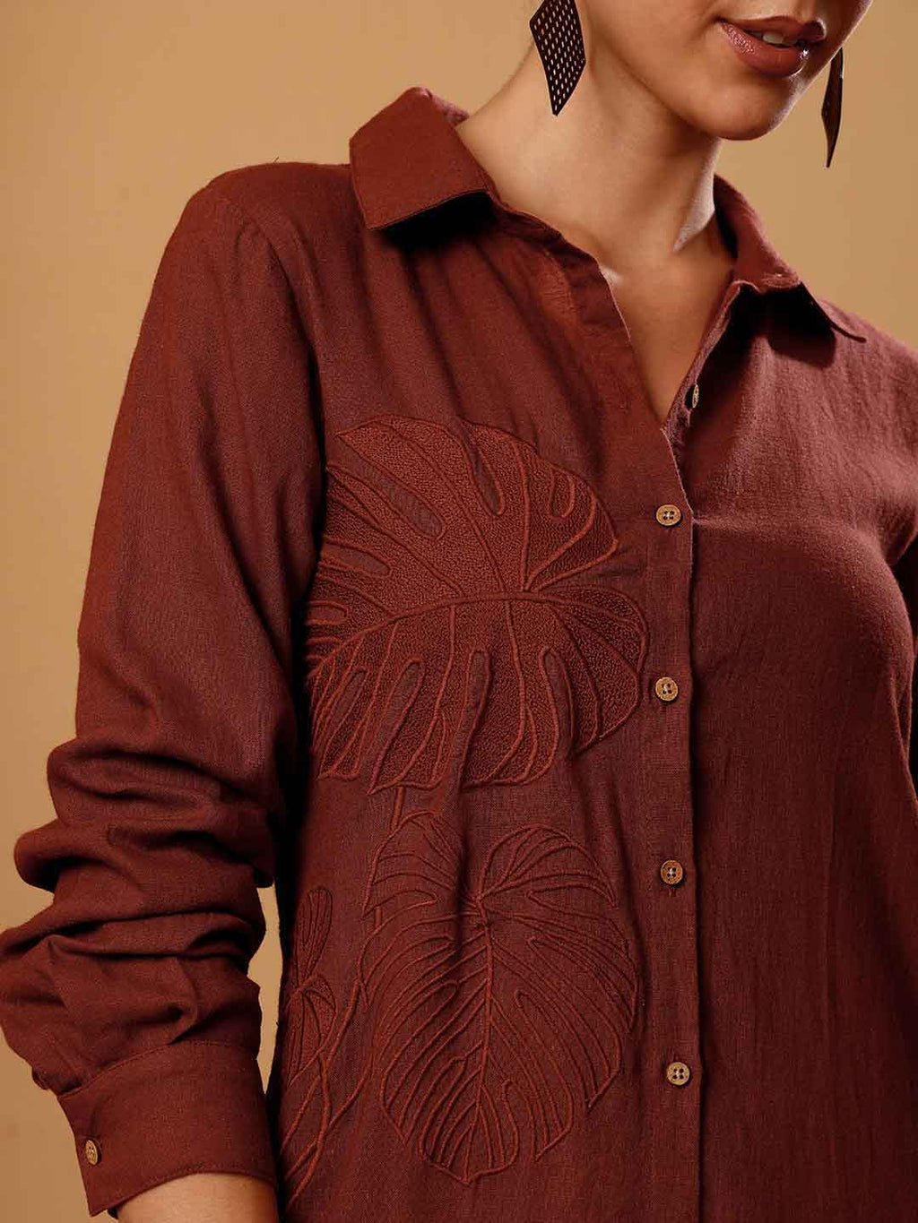 Front close-up of Brown resort dress Shirt showing intricate embroidery, fabric and neckline detail