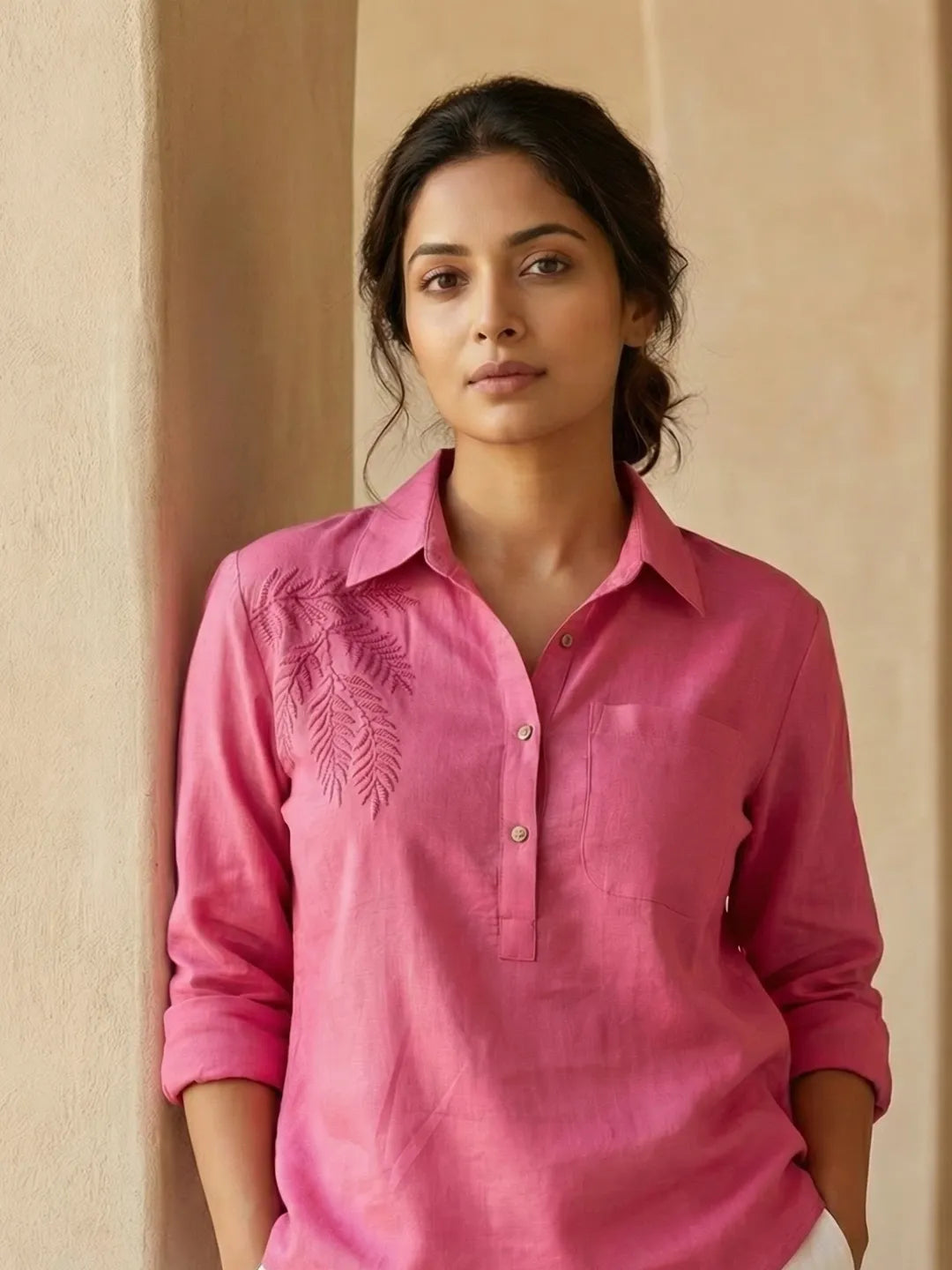 Close up short of a women wearing Linen Blend summer co-ord set -  pink beach shirt with Embroidery and White Shorts with drawstring and pockets
