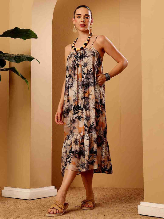 Front view of tropical floral resort dress displaying the silhouette and print clearly