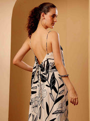 Back view of tropical printed resort maxi dress highlighting structure and styling from the rear
