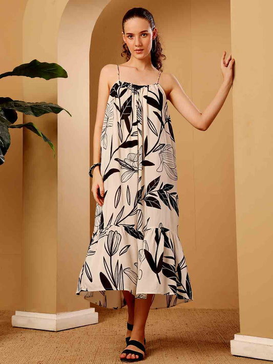 Front view of tropical printed resort maxi dress displaying the silhouette and print clearly

